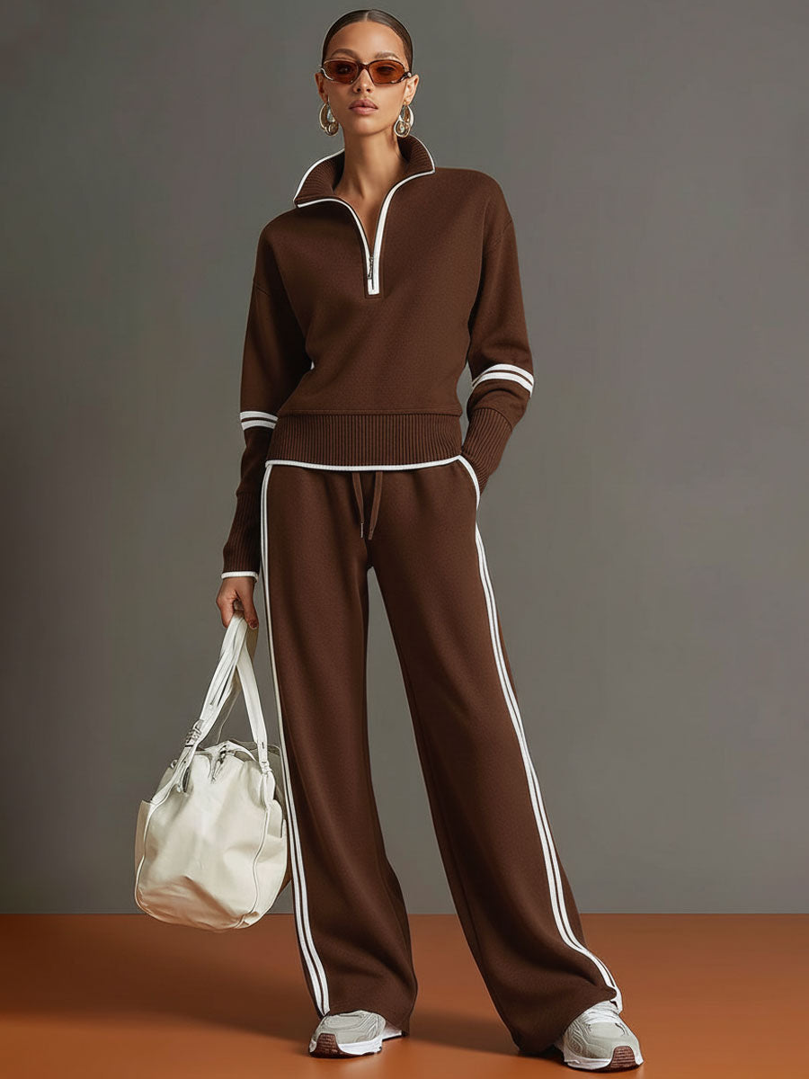 Carla - Retro Sportski Set sa Remenom u Sivo-beloj Boji sa Polu-zatvaračem i Širim Pantalonama