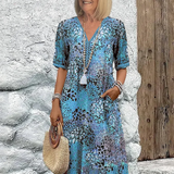 Anthea - Elegantna cvjetna midi haljina